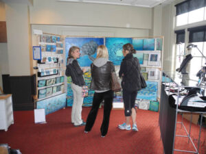 Artist Andrea Seibt showing her work at the Oakville Artists Show and Sale