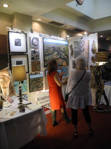 Artist, Kristina Kirkwood showing her work during the Oakville Artists Show