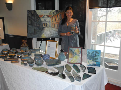 Artist Inga Gircyte displaying her pottery at the Oakville Artists Spring Show and Sale
